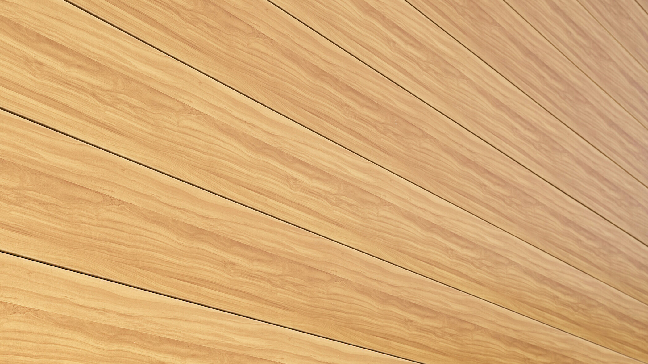 Nahaufnahme der Aluminiumfassade aus PREFA Sidings in der Farbe Eiche Natur an einem Einfamilienhaus in Usingen, Deutschland