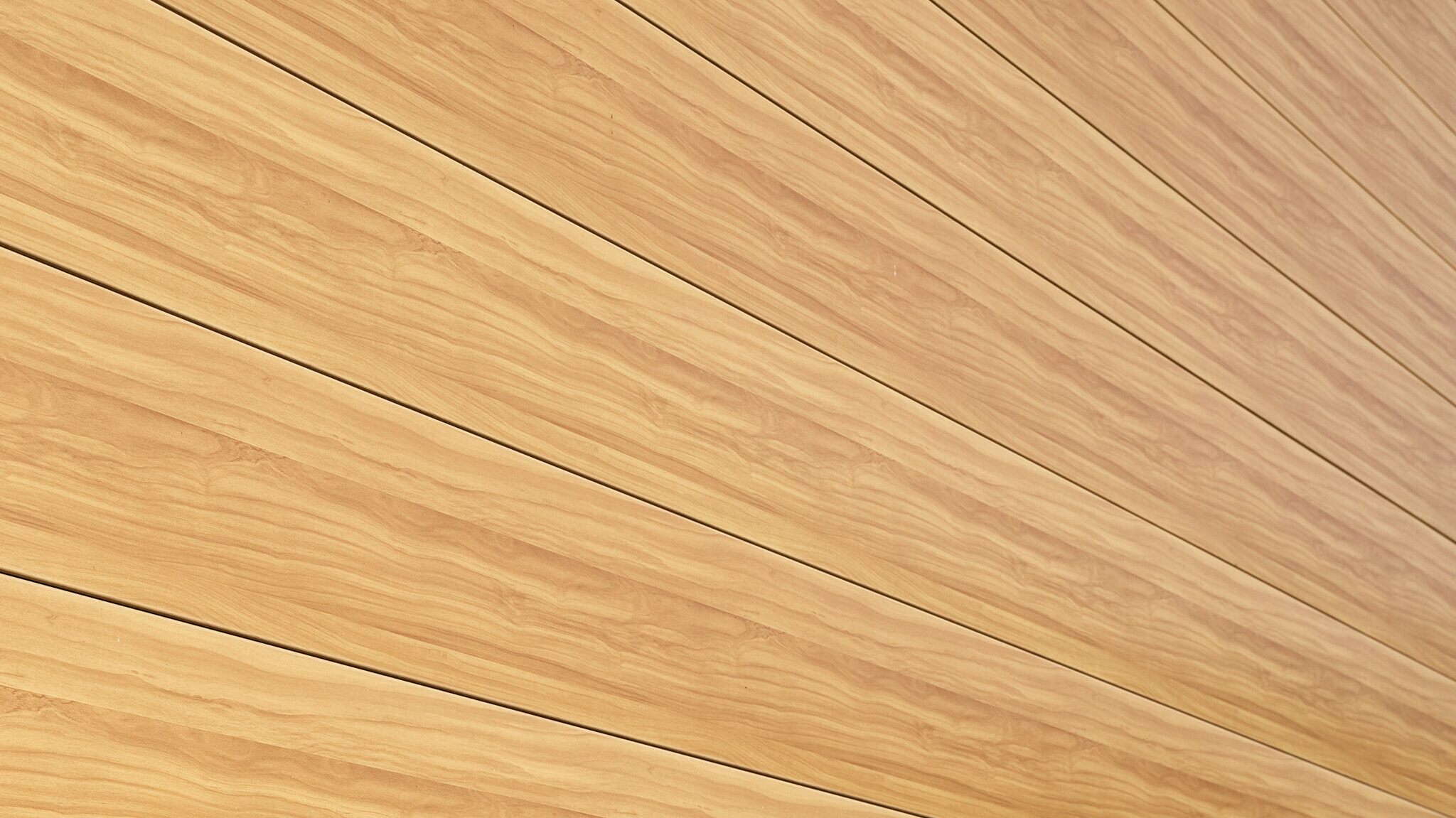 Nahaufnahme der Aluminiumfassade aus PREFA Sidings in der Farbe Eiche Natur an einem Einfamilienhaus in Usingen, Deutschland