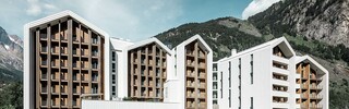 Vista laterale Hotel des Alpes a Courmayeur ai piedi del Mont Blanc, rivestito in PREFALZ P.10 bianco prefa