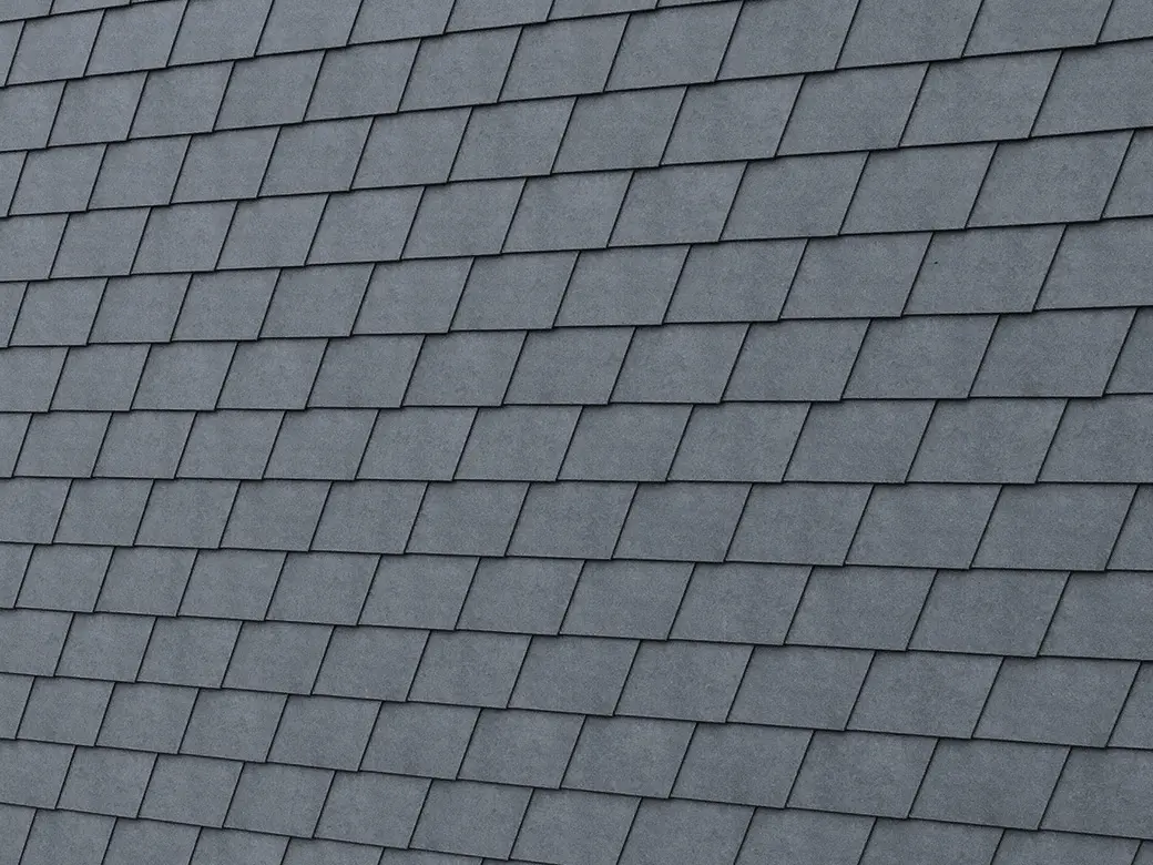 Particolare della scandola per facciata PREFA in P.10 grigio pietra