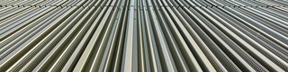 Zoom sur la façade PREFALZ dans la teinte bronze.