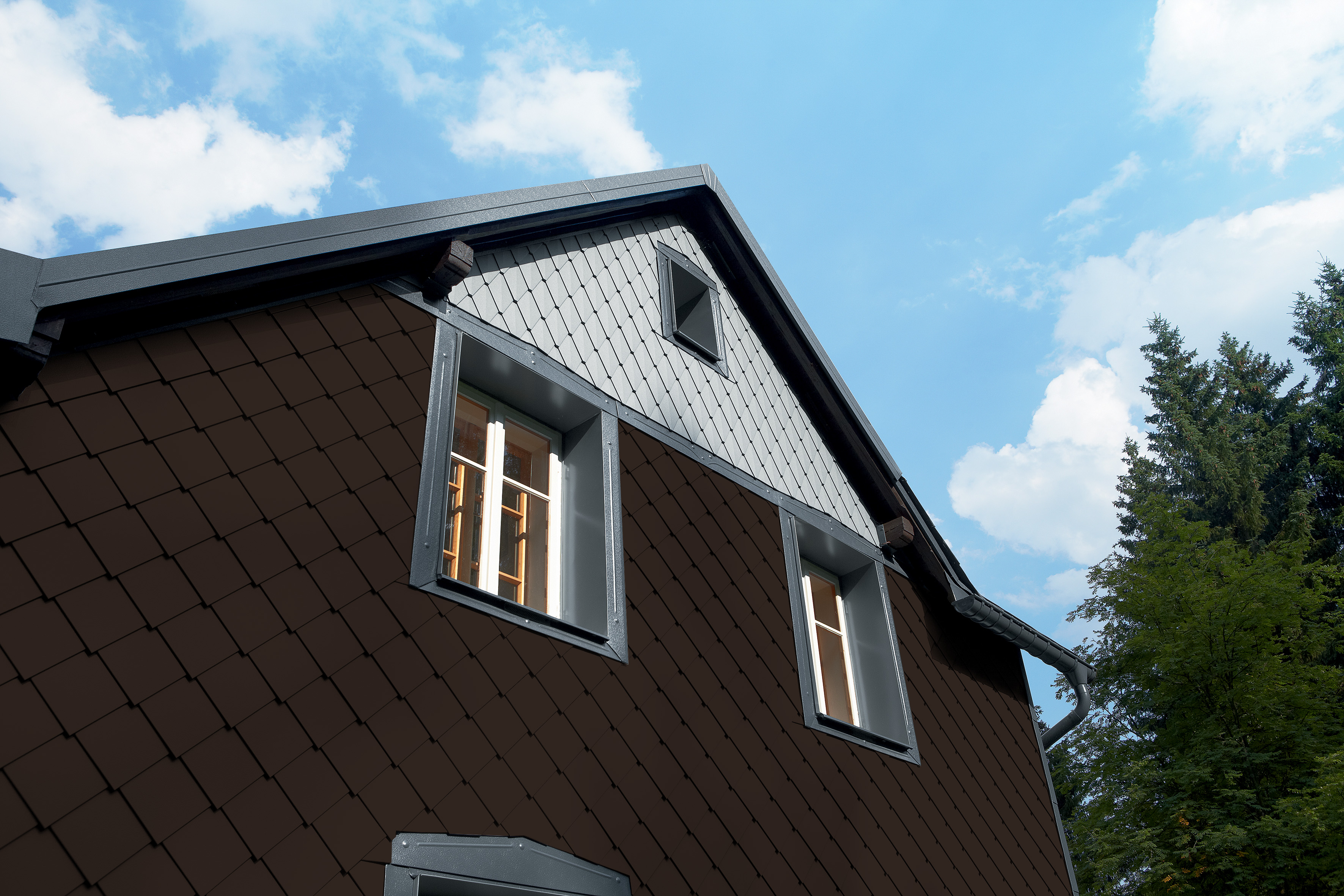 Referenze PREFA Sistemi per facciata Losanga 20 11 P.10 testa di moro