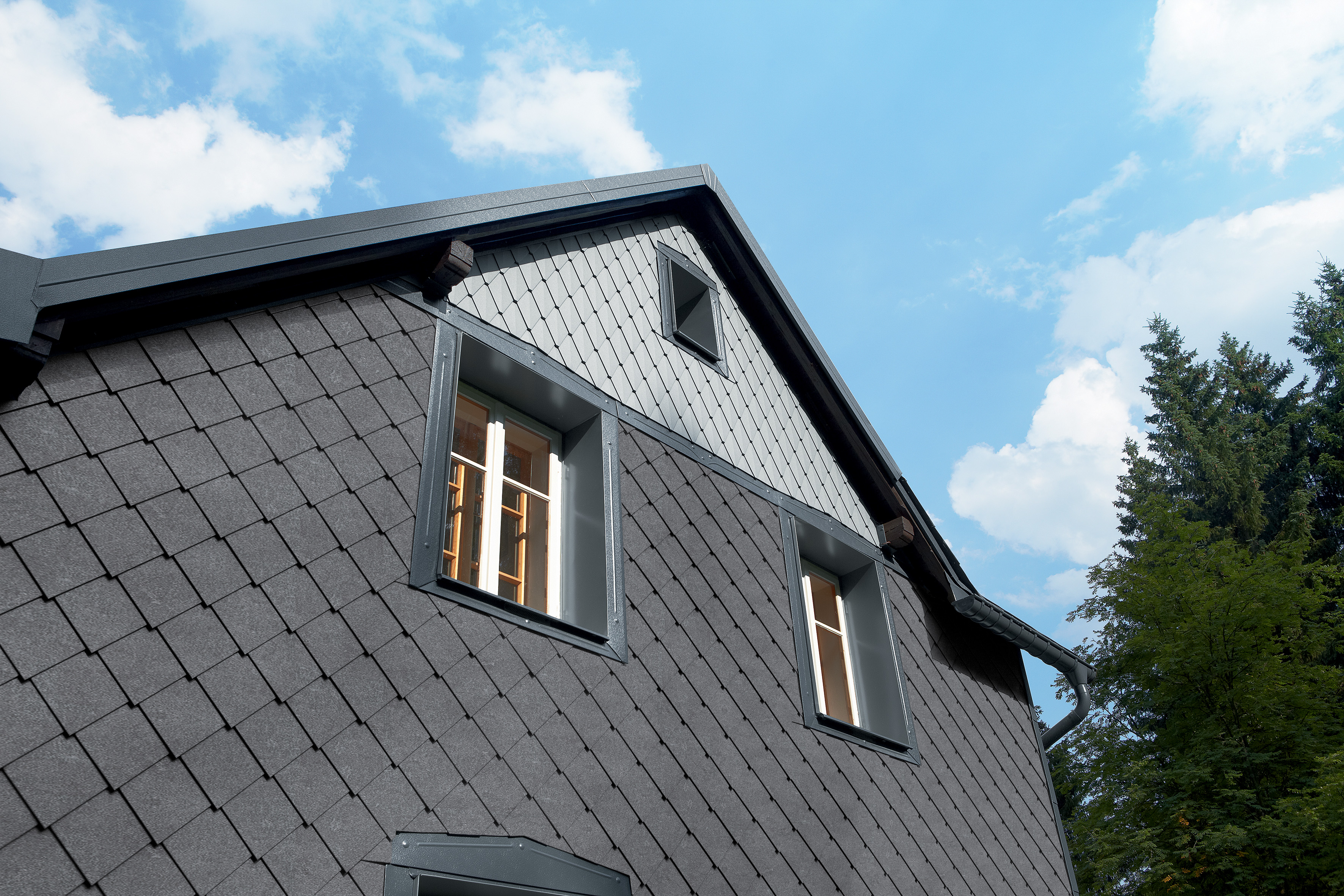 Referenze PREFA Sistemi per facciata Losanga 20 43 P.10 grigio pietra