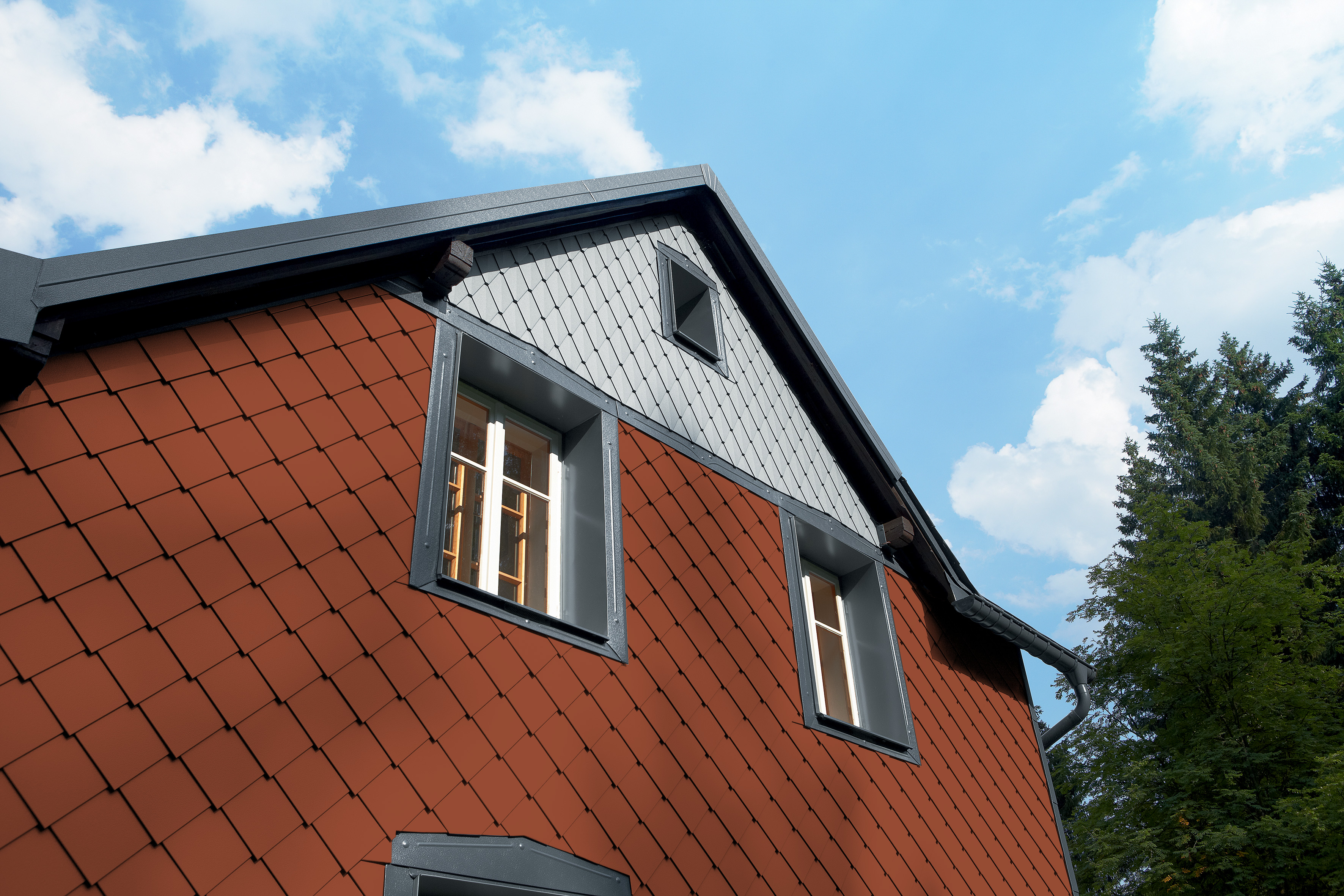 Referenze PREFA Sistemi per facciata Losanga 20 04 P.10 rosso cotto