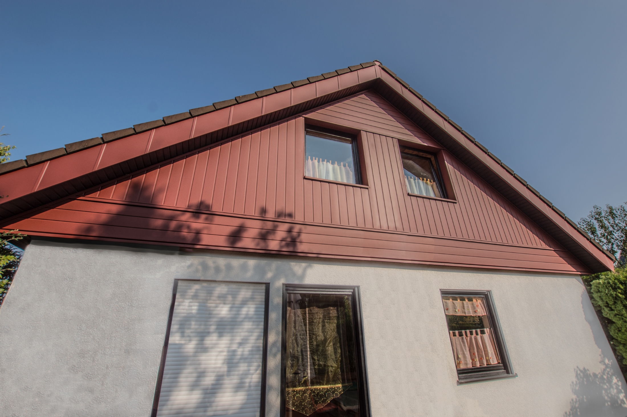 Referenze PREFA Sistemi per facciata Doga di rivestimento 05 P.10 rosso ossido