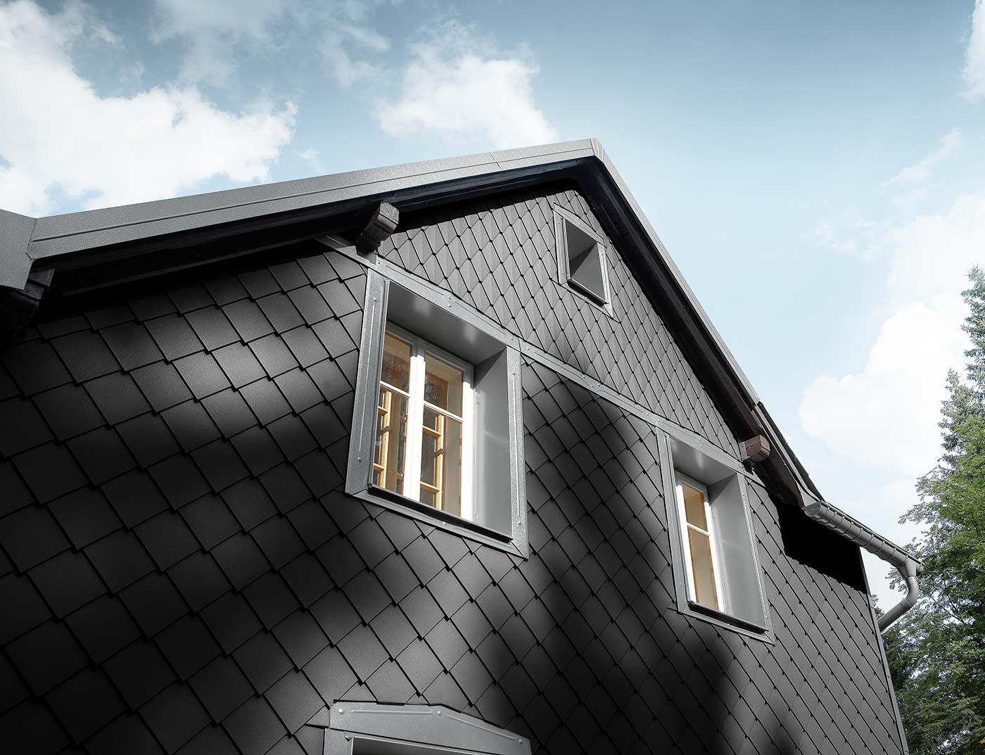 Referenze PREFA Sistemi per facciata Losanga 20 03 P.10 nero