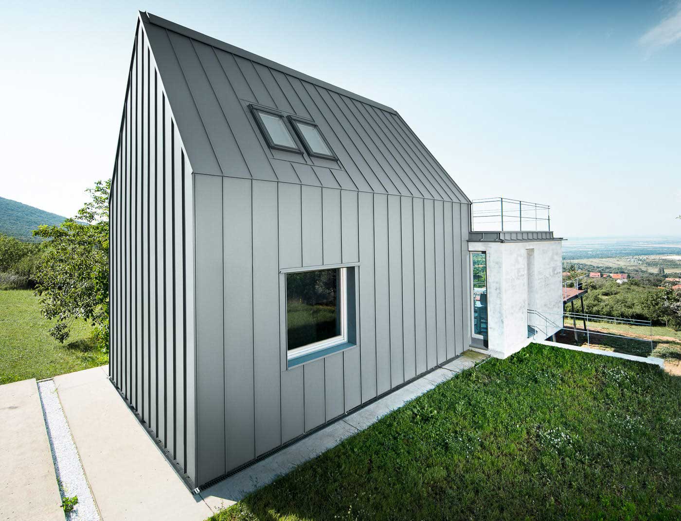 Bâtiments de référence PREFA Systèmes de façades Système de façade Prefalz ® 07 P.10 gris souris